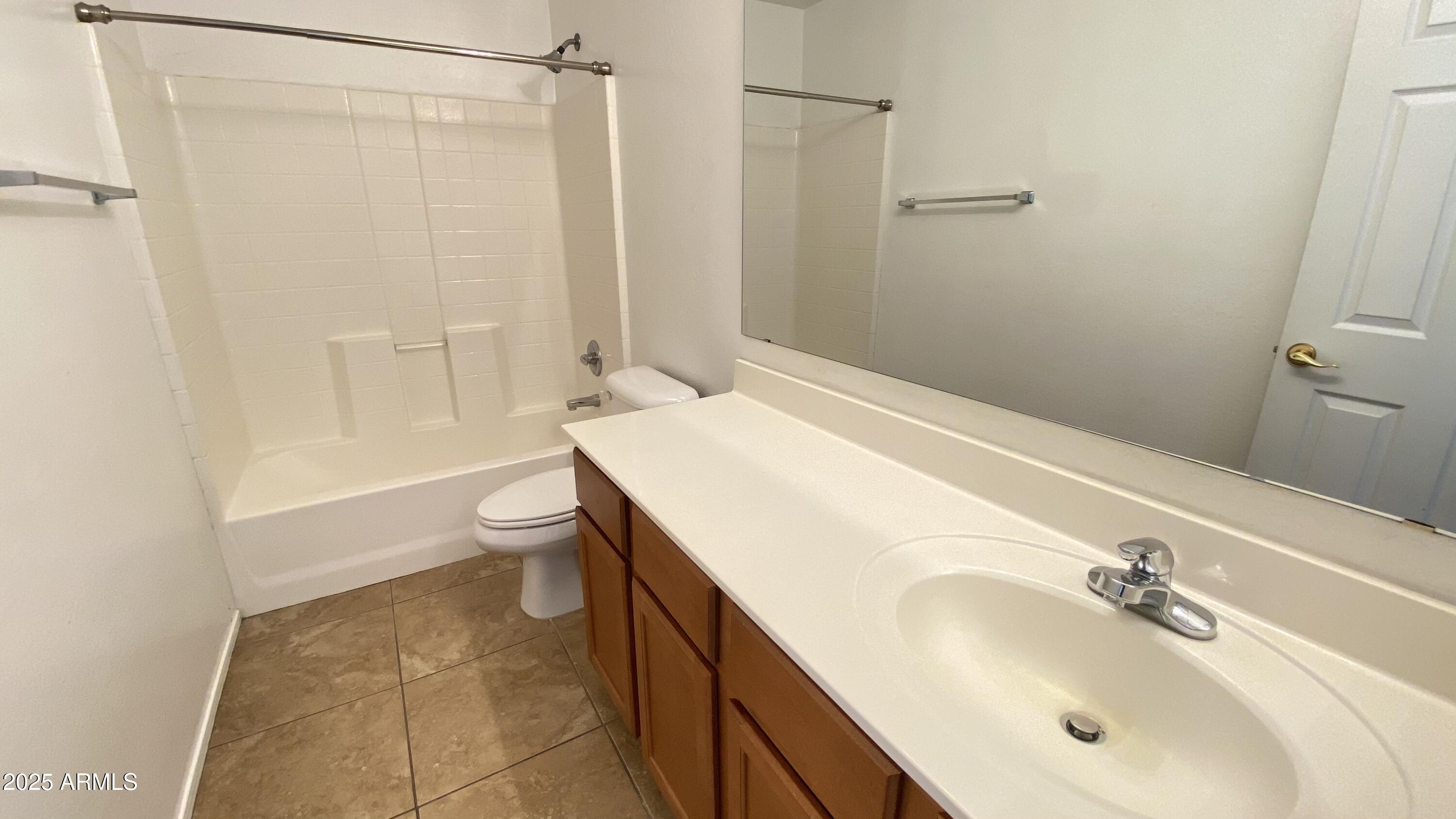 7425 West Crown King Road Phoenix, AZ 85043 - Photo 21 of 27 a bathroom with a sink a toilet and shower