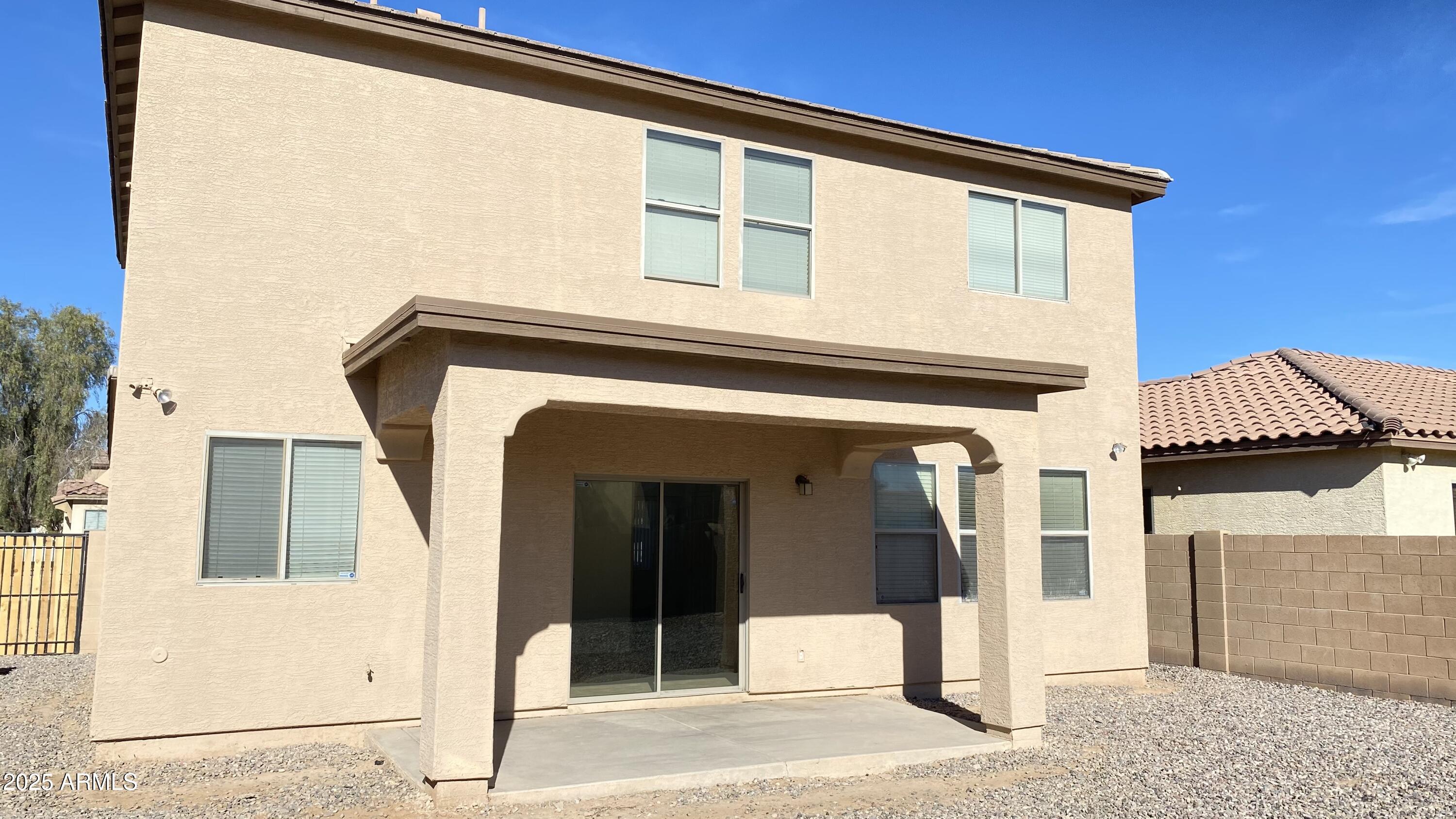 7425 West Crown King Road Phoenix, AZ 85043 - Photo 27 of 27 a front view of a house with a garage