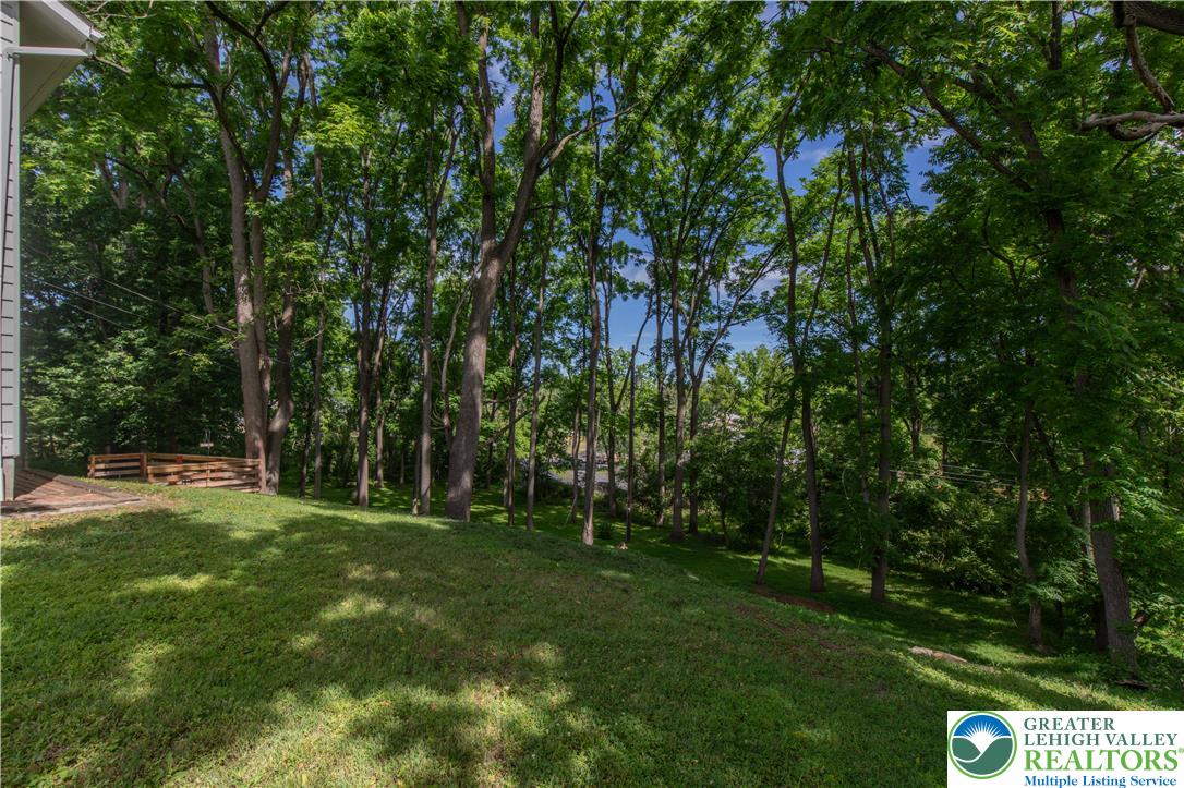 2011 Greenwood Road Allentown, PA 18103 - Photo 46 of 52 A verdant hillside property, canopied by mature trees, offers a private, natural setting.