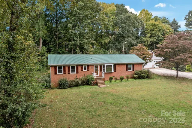 a view of a house with garden
