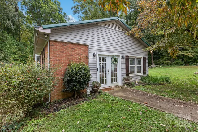 a backyard of a house with seating space