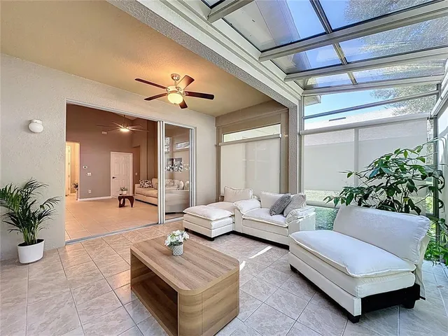 an aerial view of a house with a garden