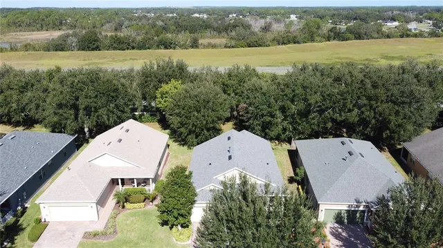 a view of a golf course with a lake