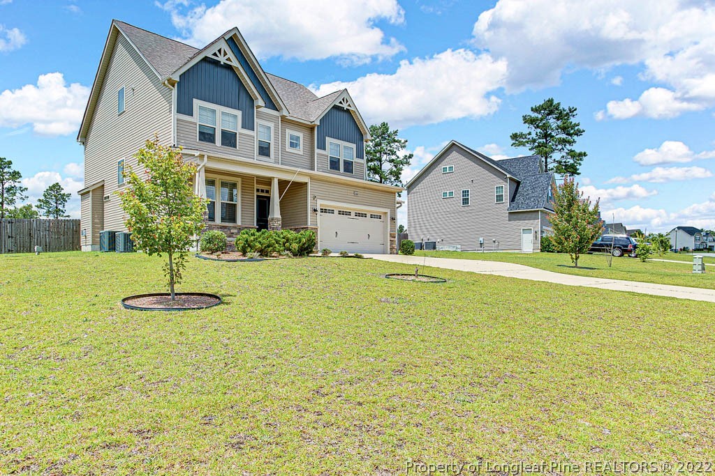 268 Turriff Way Cameron, NC 28326 - Photo 1 of 44 a front view of a house with a yard