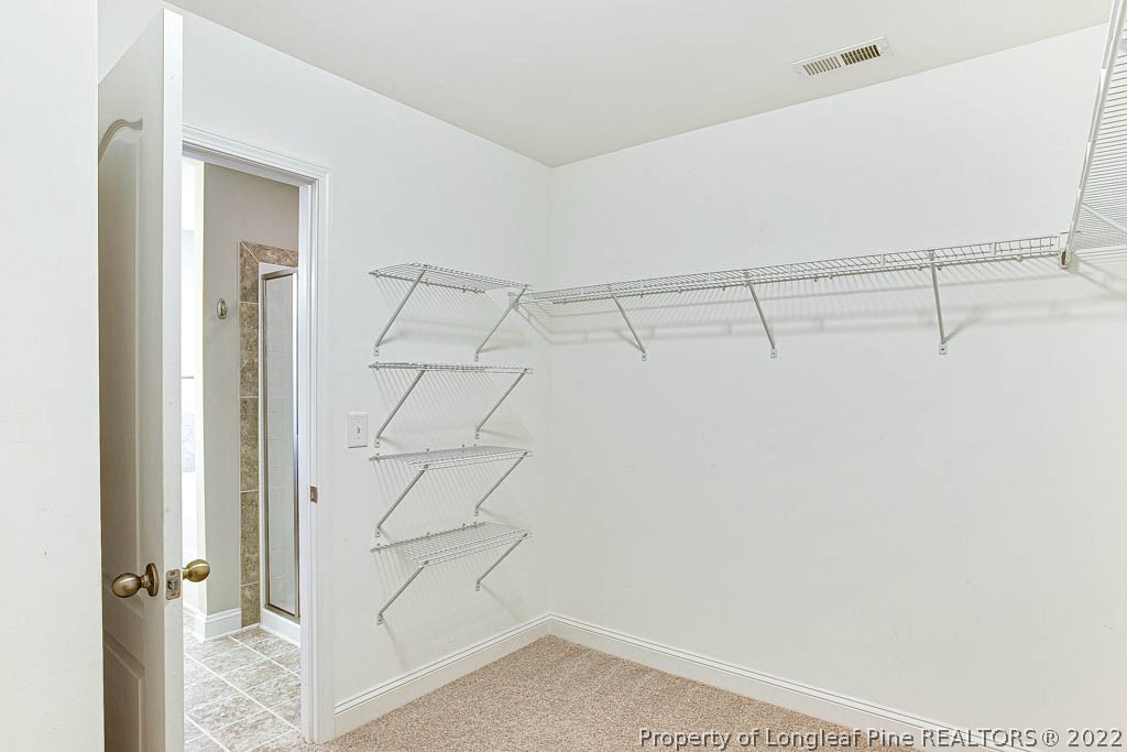 268 Turriff Way Cameron, NC 28326 - Photo 24 of 44 a bathroom with a shower