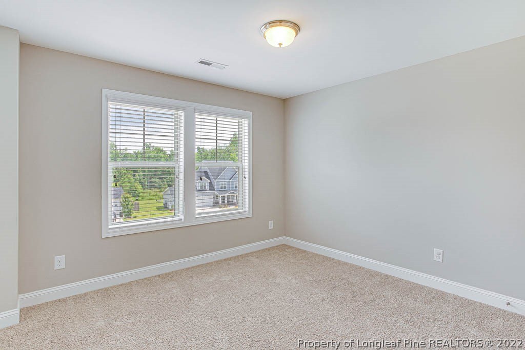 268 Turriff Way Cameron, NC 28326 - Photo 25 of 44 an empty room with a window