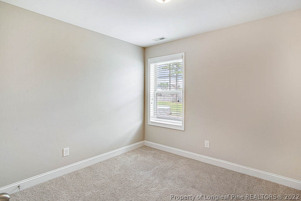 268 Turriff Way Cameron, NC 28326 - Photo 31 of 44 an empty room with a window