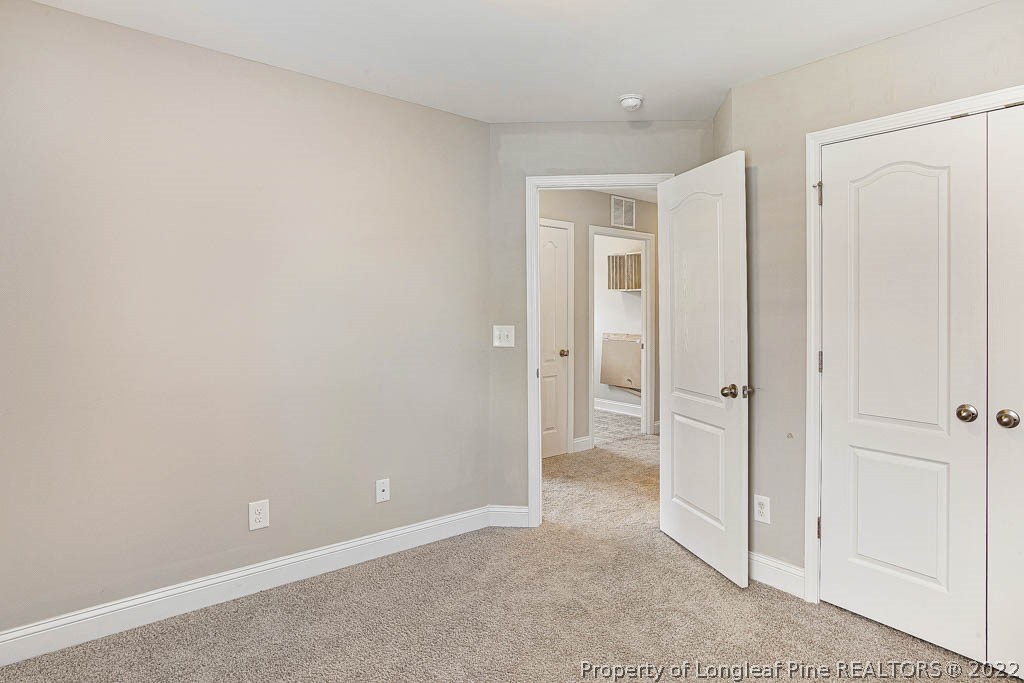 268 Turriff Way Cameron, NC 28326 - Photo 32 of 44 an empty room with closet area