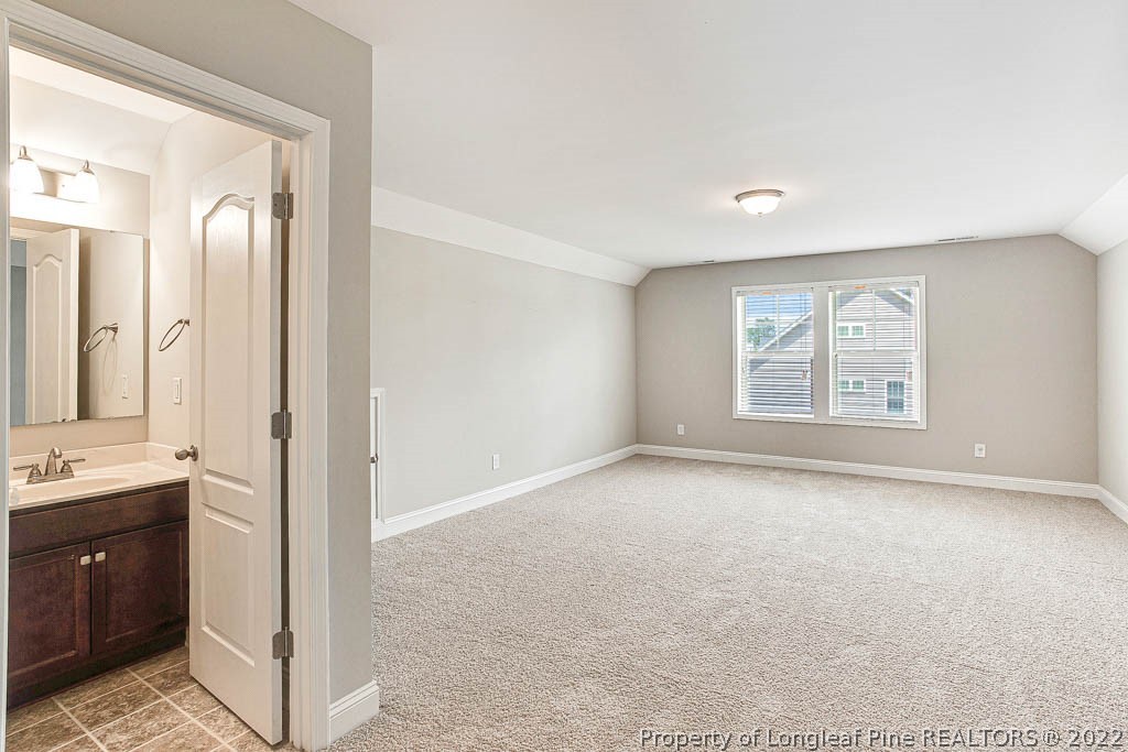 268 Turriff Way Cameron, NC 28326 - Photo 33 of 44 a view of an empty room with window and cabinet