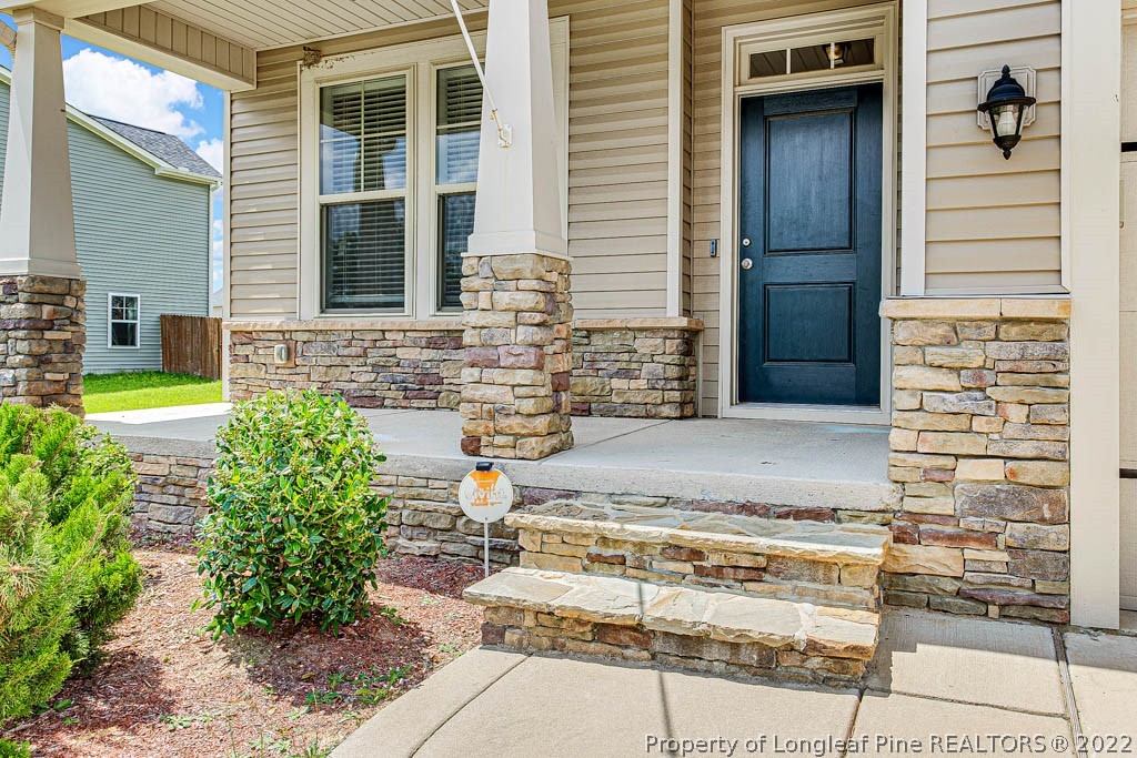 268 Turriff Way Cameron, NC 28326 - Photo 4 of 44 a view of front door of house and yard