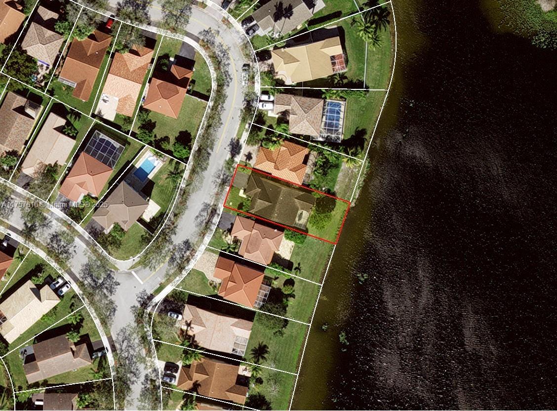 959 Falling Water Road Weston, FL 33326 - Photo 23 of 24 an aerial view of residential houses with outdoor space