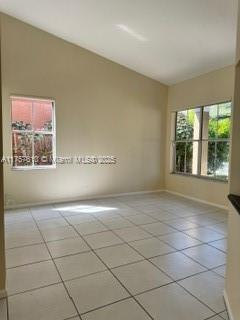 959 Falling Water Road Weston, FL 33326 - Photo 10 of 24 a view of an empty room with a window