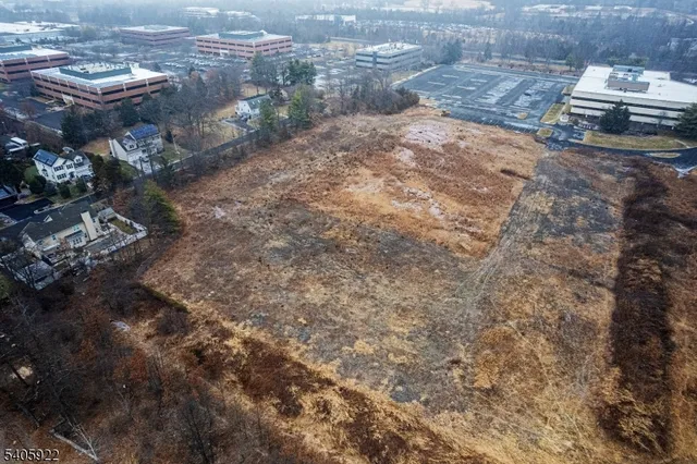 a view of a backyard of a house