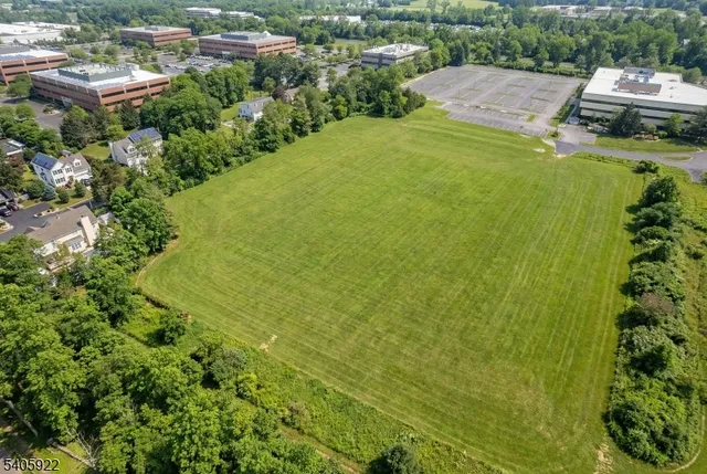 a view of a lake with a building in the background
