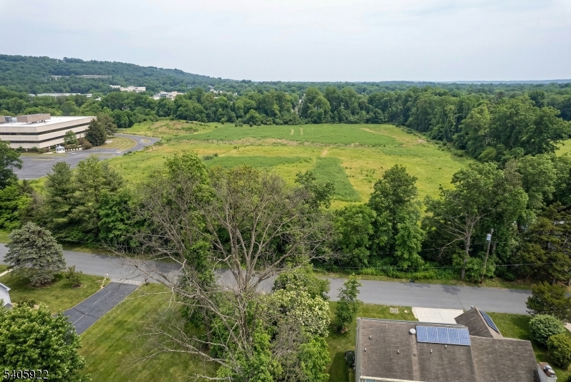0 Woodside Lane Bridgewater, NJ 08807 - Photo 22 of 25 a view of a city with lush green forest
