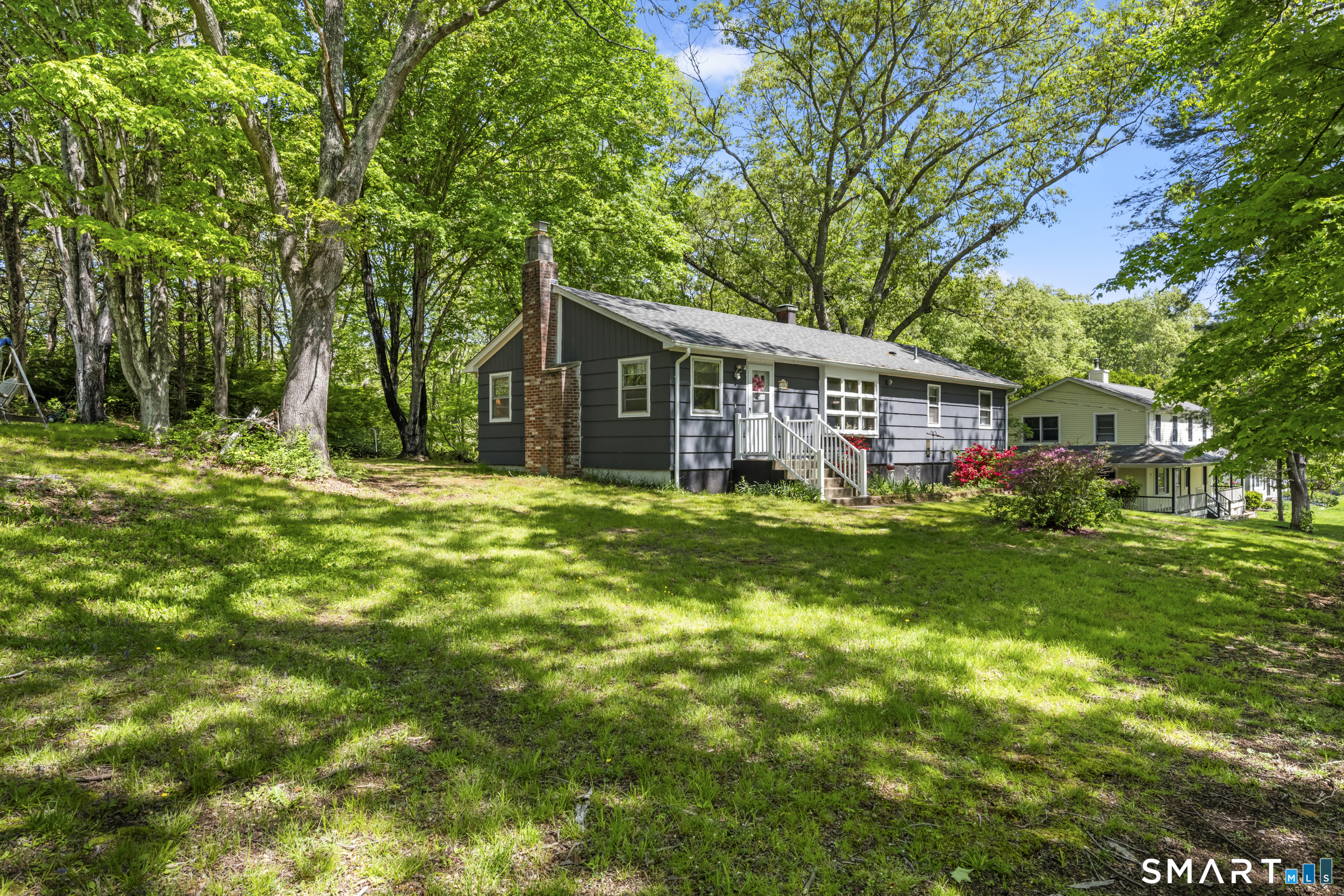 121 River Road Preston, CT 06365 - Photo 34 of 37 a view of a house with a big yard and large trees