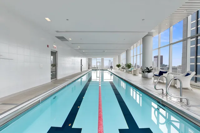 a large kitchen with counter space and a sink