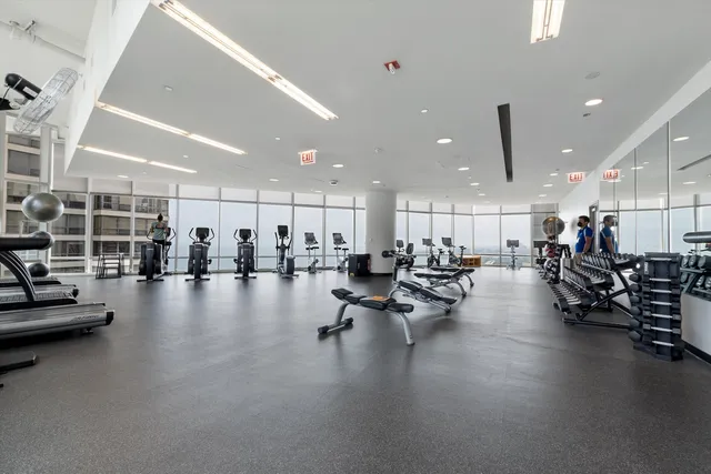 a room with lots of furniture and a table