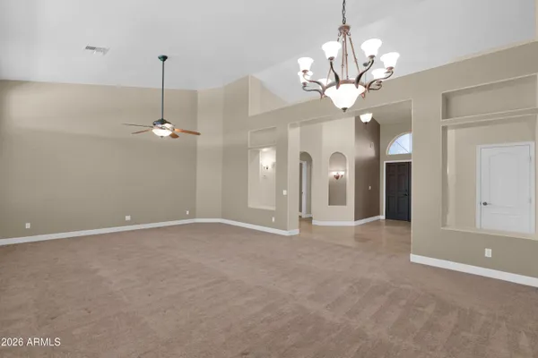 a kitchen with a sink a counter top space and cabinets