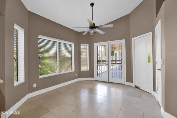 a large bathroom with a double vanity sink mirror and shower