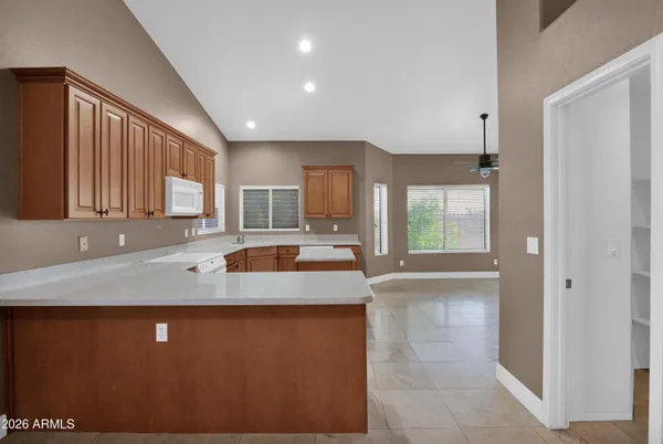 a bathroom with a sink double vanity granite and a mirror