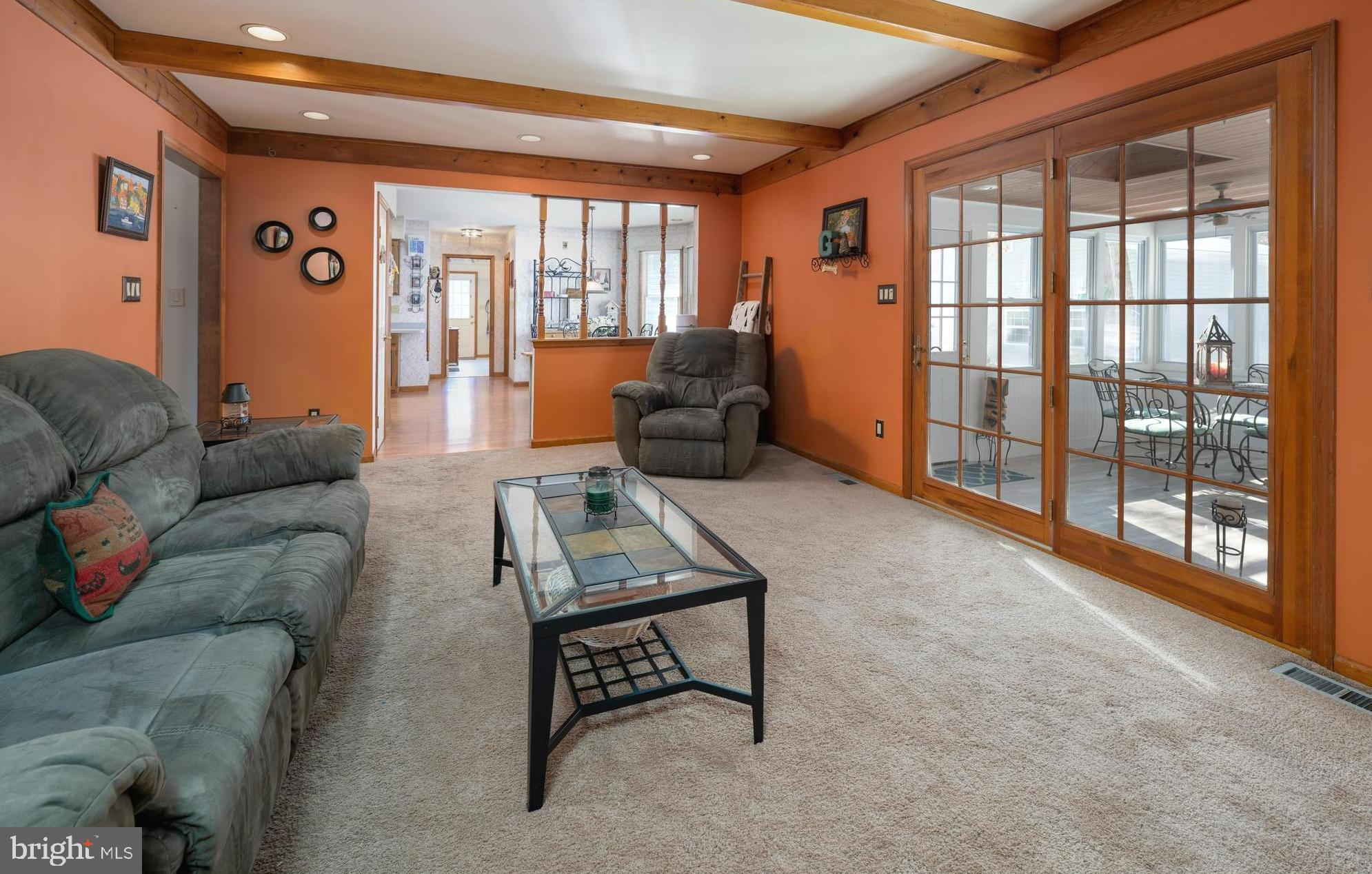 1440 Stokes Road Medford, NJ 08055 - Photo 4 of 35 a living room with furniture and a floor to ceiling window