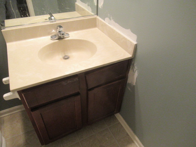 508 Ramsden Road Plano, IL 60545 - Photo 15 of 31 a close up of a sink and a mirror