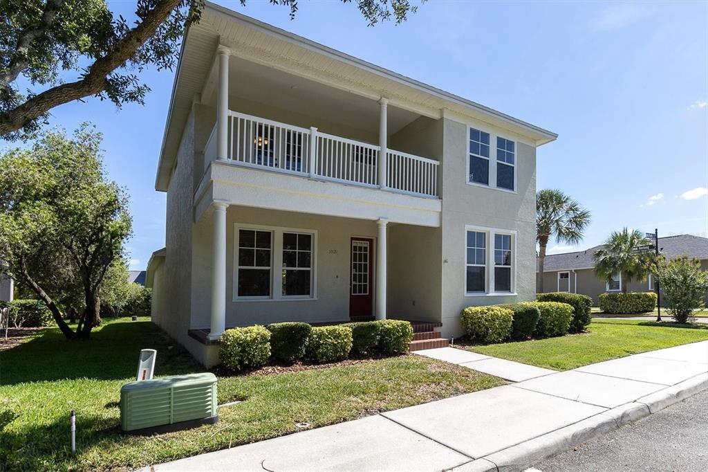 10121 Porch Street New Port Richey, FL 34655 - Photo 2 of 57 a front view of a house with a yard