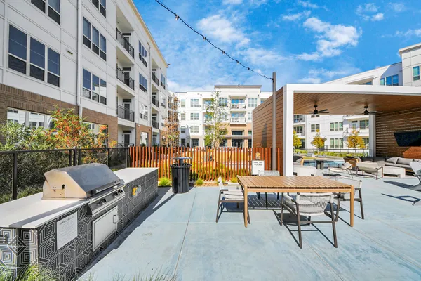 a bathroom with a bathtub and a sink