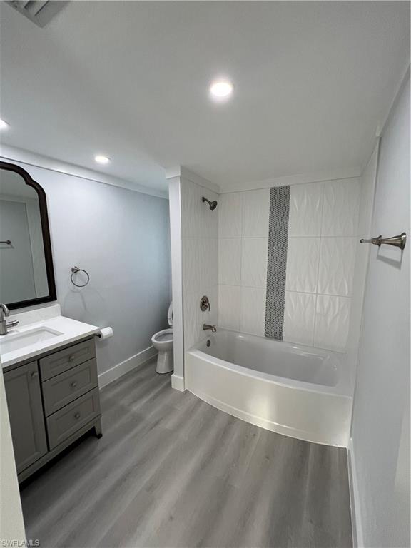 5345 Hardee Street Naples, FL 34113 - Photo 17 of 20 a bathroom with a sink and a mirror