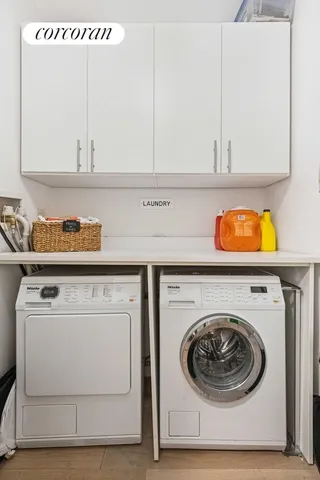 a view of a hallway with a painting on the wall