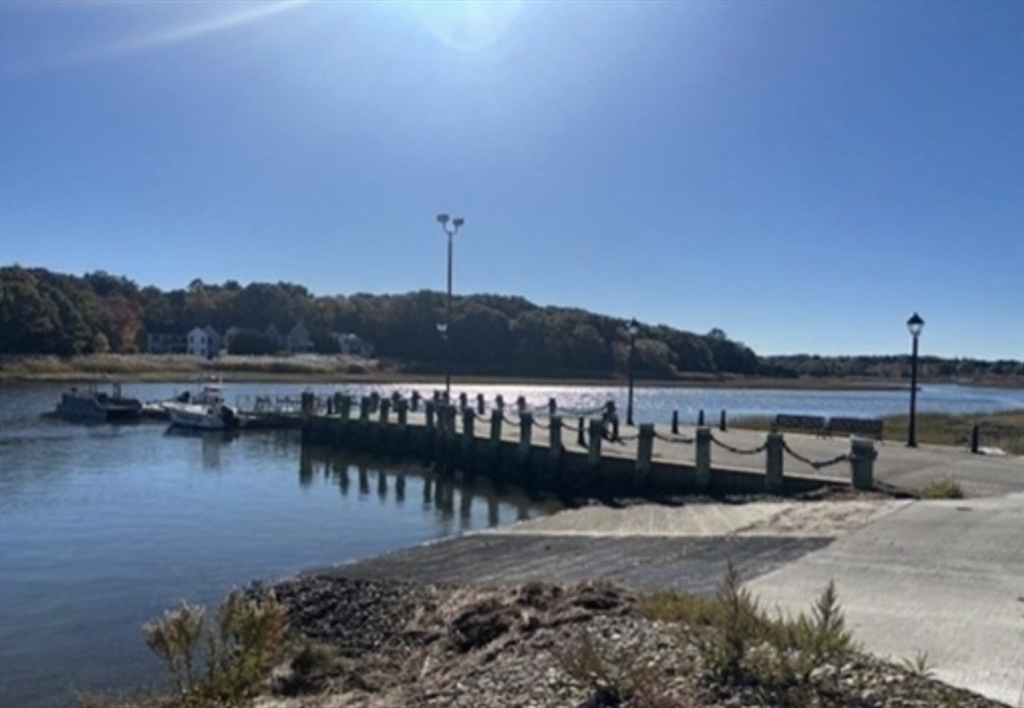 40 Landing Road Kingston, MA 02364 - Photo 9 of 10 a view of a lake with a city