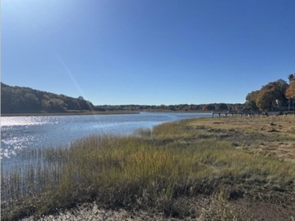 40 Landing Road Kingston, MA 02364 - Photo 10 of 10 a view of lake with mountain in background