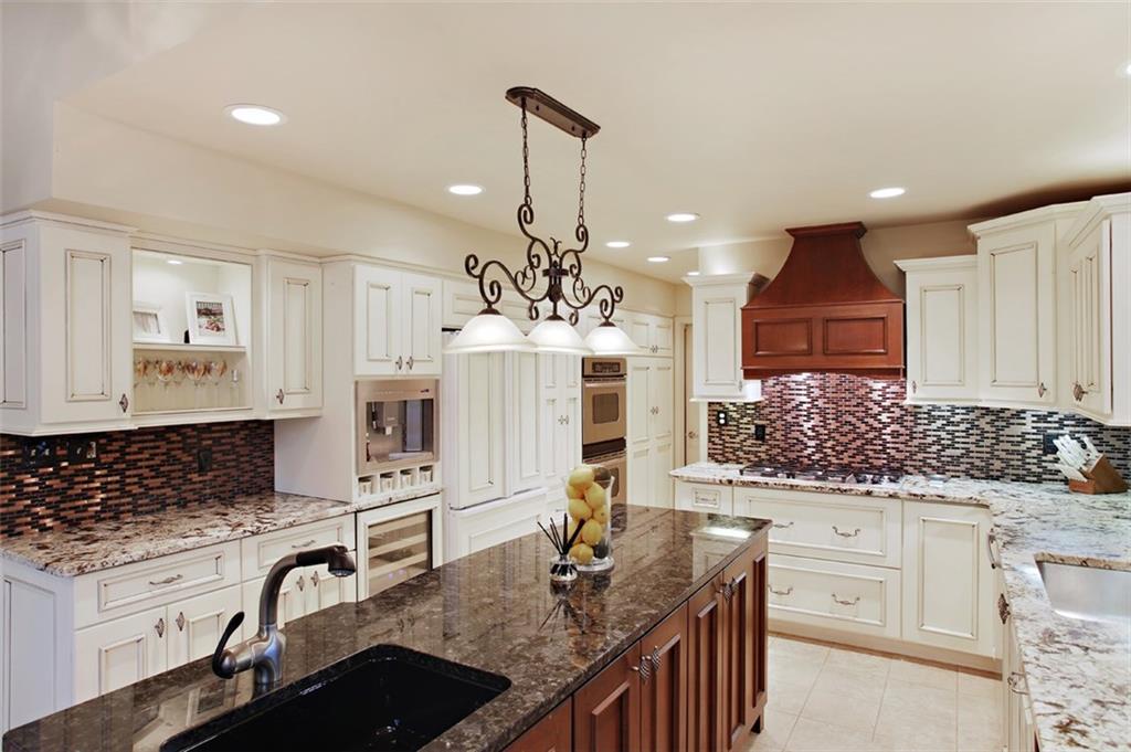 576 New Texas Road Pittsburgh, PA 15239 - Photo 11 of 25 Multiple recessed lights make this kitchen bright any time of the day or night. Great for entertaining.