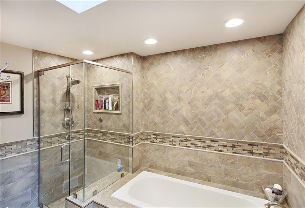 576 New Texas Road Pittsburgh, PA 15239 - Photo 17 of 25 Just finished master bath with all amenities-note the quality of the tile walls, glass shower with rain head shower fixture.