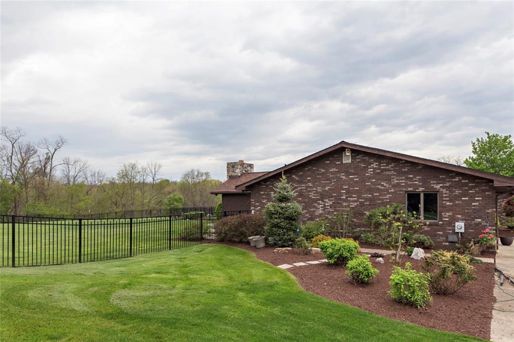 576 New Texas Road Pittsburgh, PA 15239 - Photo 4 of 25 Professional landscaping all around the house.