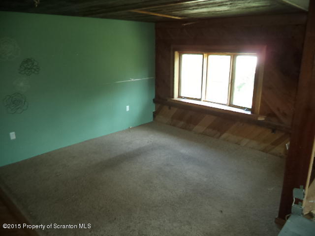 689 Fields Brook Road Nicholson, PA 18446 - Photo 6 of 14 a view of a room that has a window