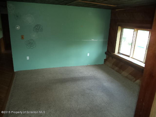 689 Fields Brook Road Nicholson, PA 18446 - Photo 7 of 14 a view of an empty room with a window