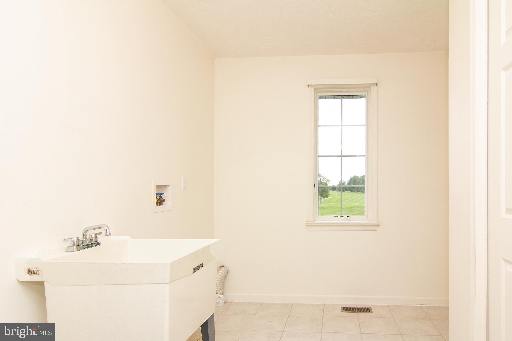 960 Teeter Road Littlestown, PA 17340 - Photo 15 of 49 Laundry/Mud room Leads to garage.