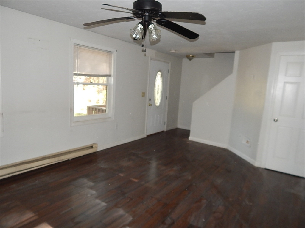 1865 Barre Road Hardwick, MA 01031 - Photo 8 of 15 a view of an empty room with a window