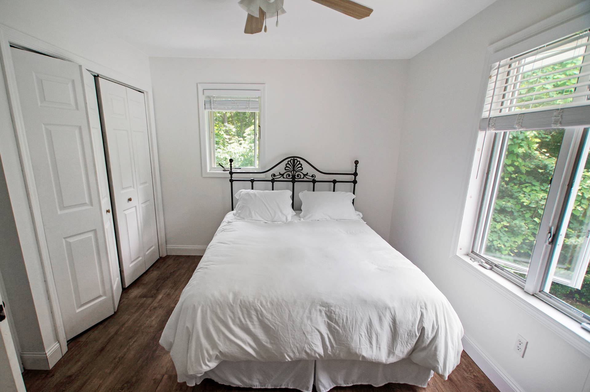 16 Norbury Road Hampton Bays, NY 11946 - Photo 13 of 32 a bedroom with a bed and a window
