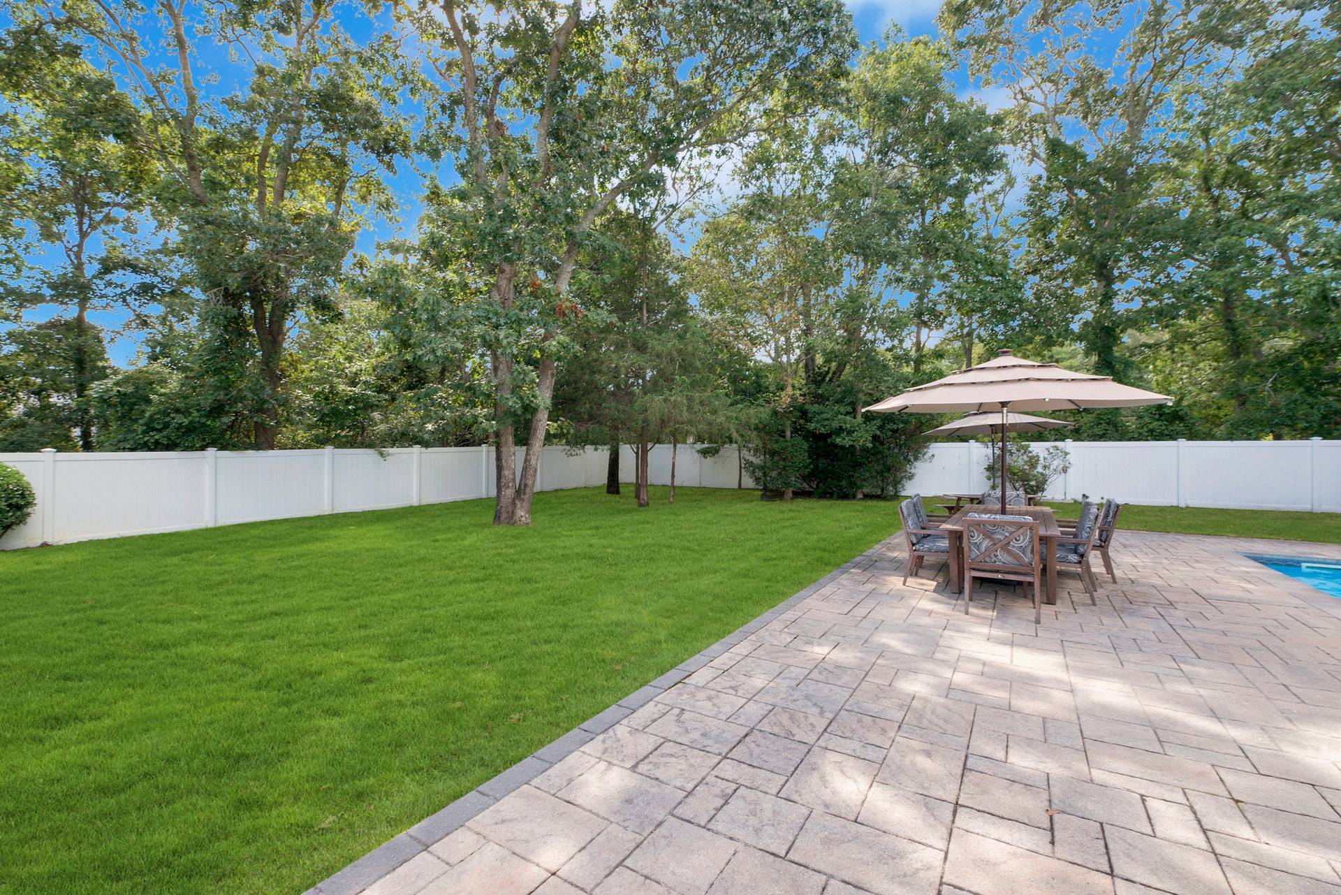 16 Norbury Road Hampton Bays, NY 11946 - Photo 26 of 32 a garden view with a seating space