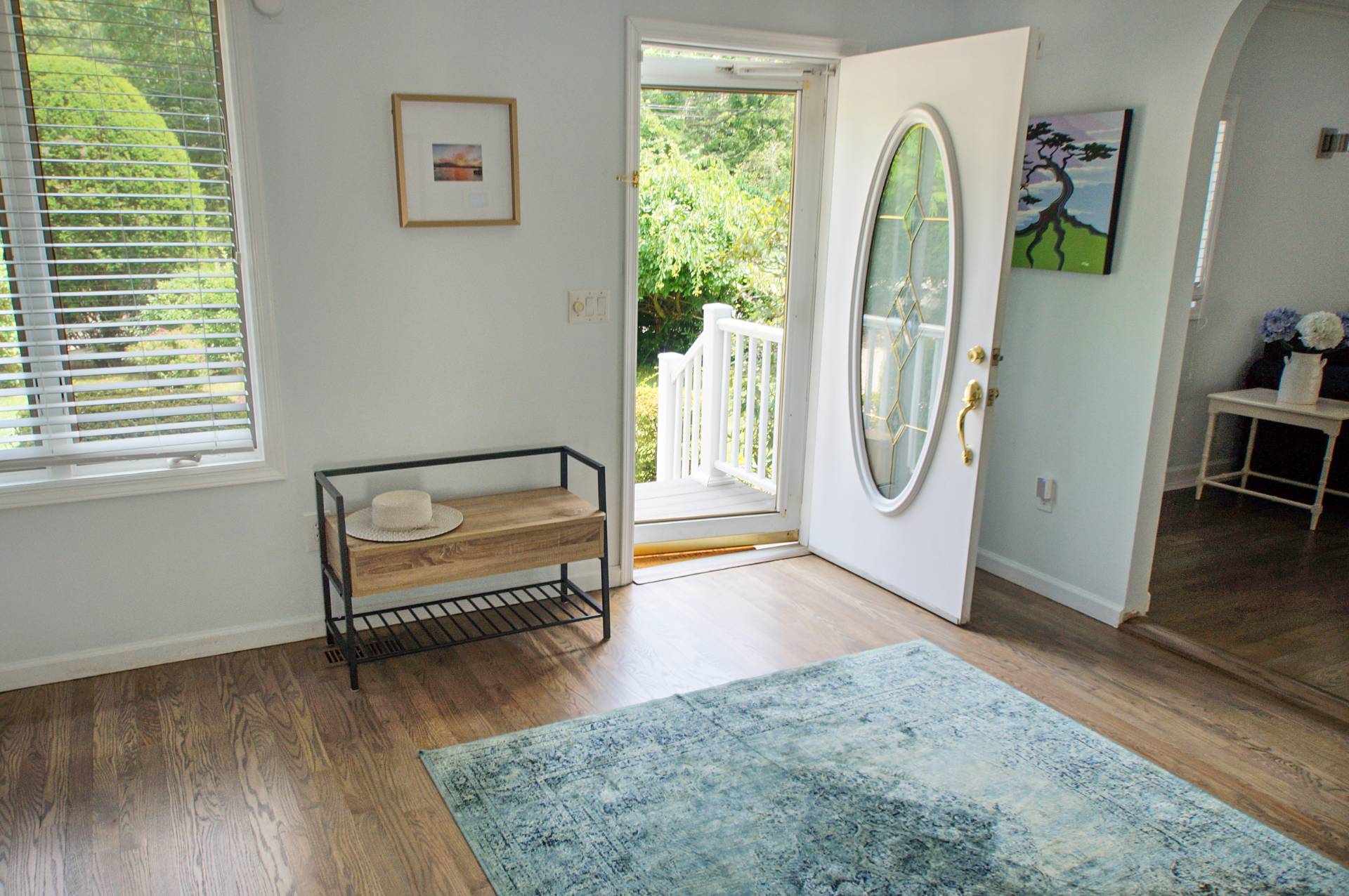 16 Norbury Road Hampton Bays, NY 11946 - Photo 3 of 32 a view of a livingroom with furniture and a window