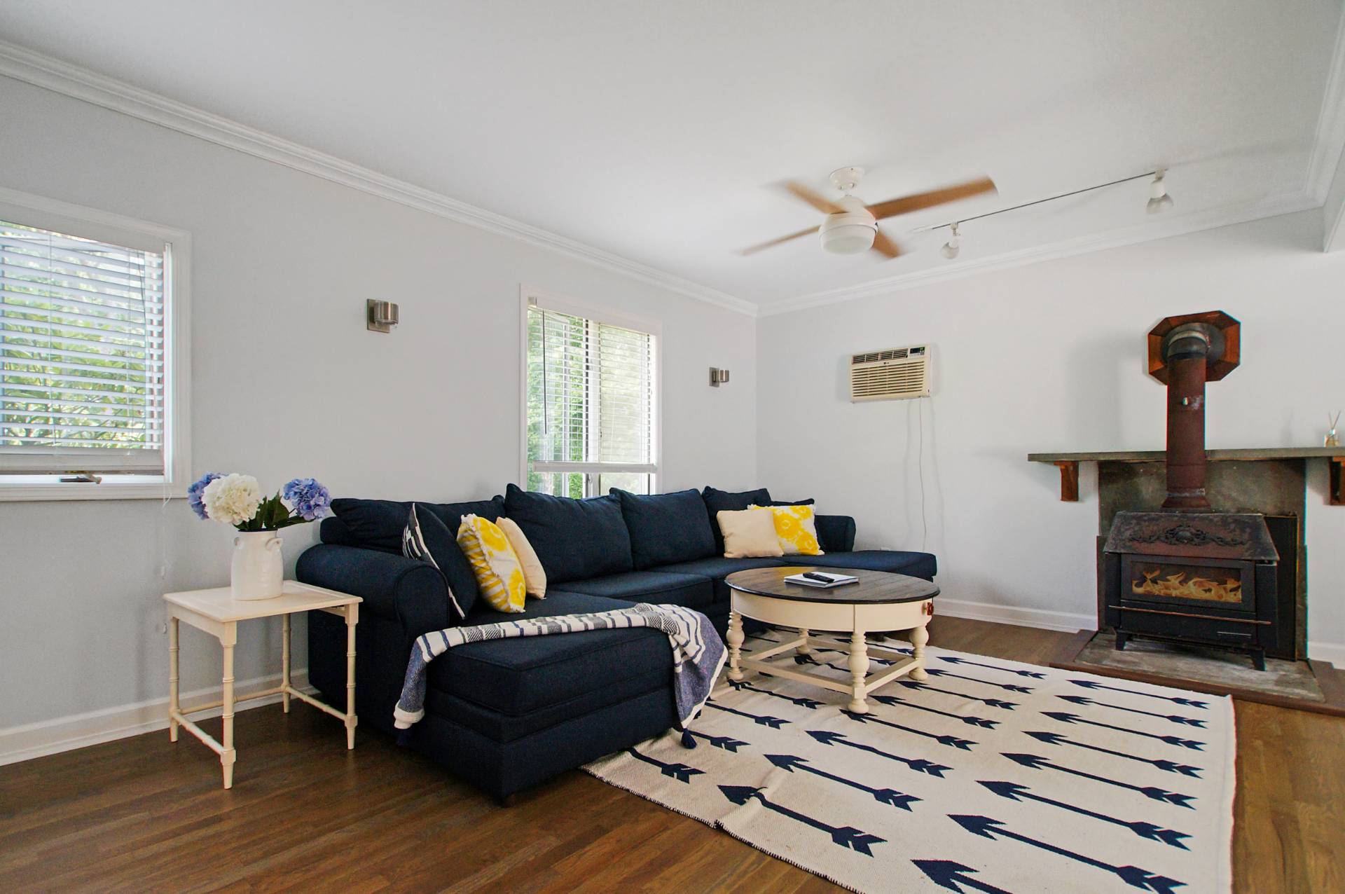 16 Norbury Road Hampton Bays, NY 11946 - Photo 6 of 32 a living room with furniture and wooden floor