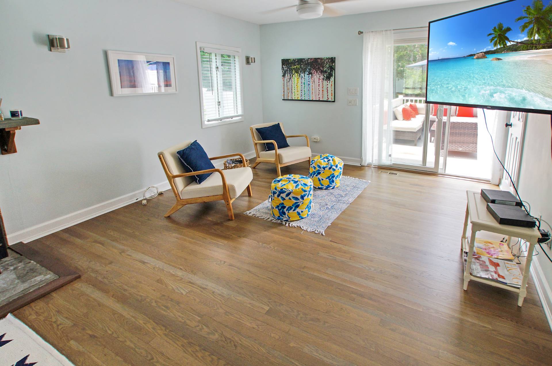 16 Norbury Road Hampton Bays, NY 11946 - Photo 8 of 32 a living room with furniture and a wooden floor