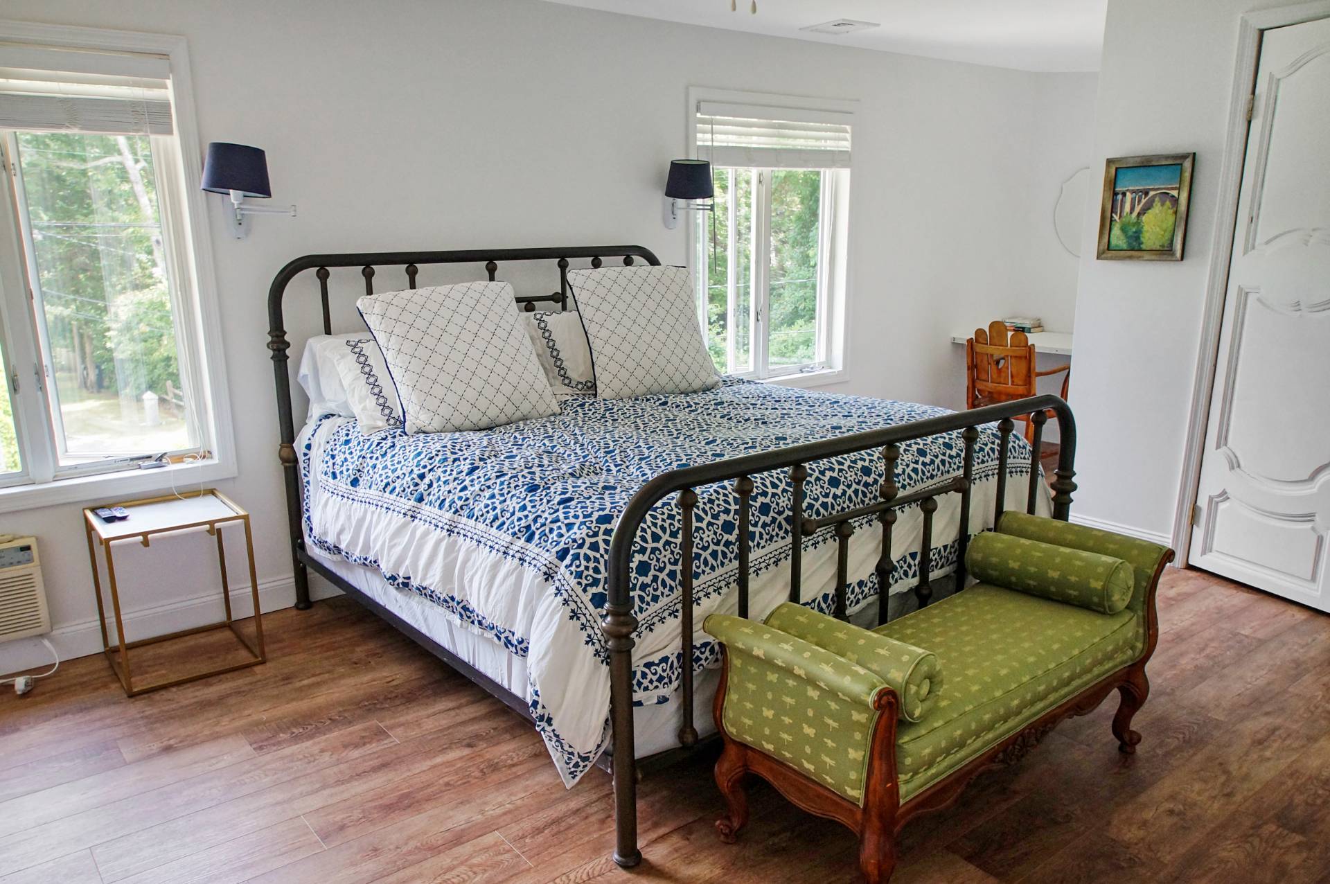 16 Norbury Road Hampton Bays, NY 11946 - Photo 9 of 32 a bedroom with a bed and a window