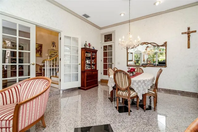 a kitchen with stainless steel appliances granite countertop a stove a refrigerator a sink and dishwasher