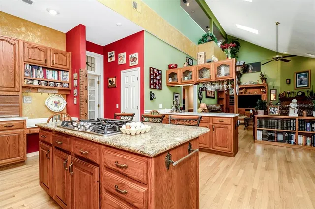 a view of a bedroom with furniture and windows
