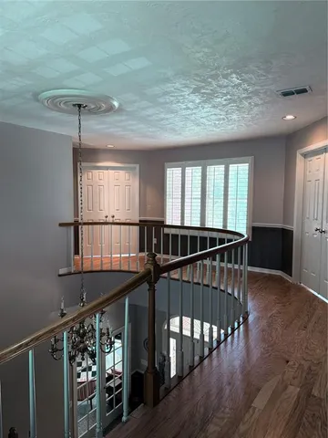 a front view of building with yard