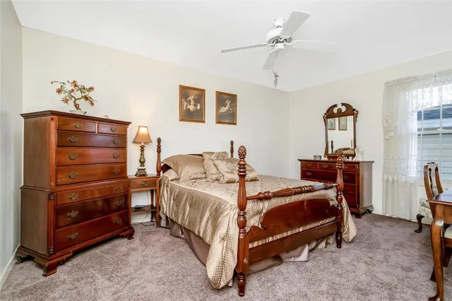 a view of a house with a yard patio and sitting area